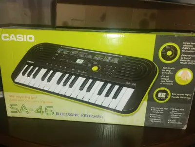 Teclado Electrónico Casio SA-46 con 32 Teclas Mini - miniatura 1