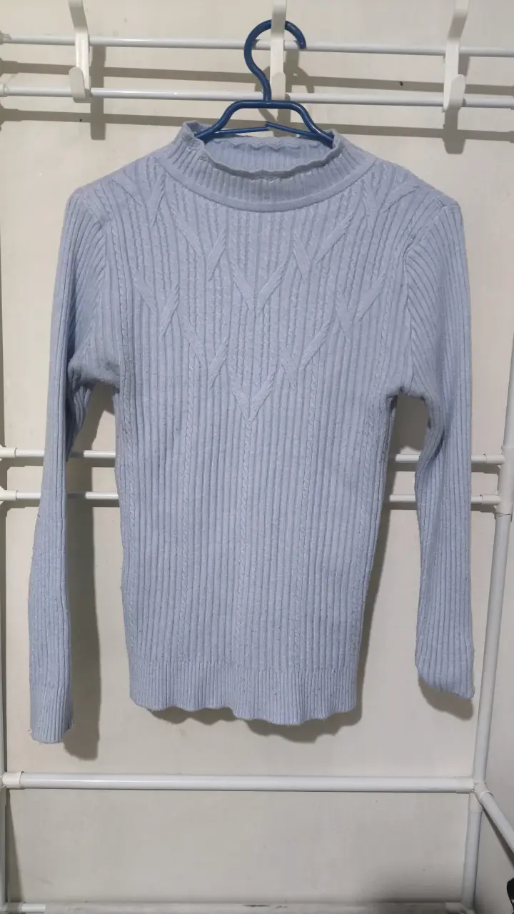 Suéter de punto azul claro para mujer