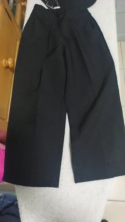 Pantalones negros de tela para niños - miniatura 1