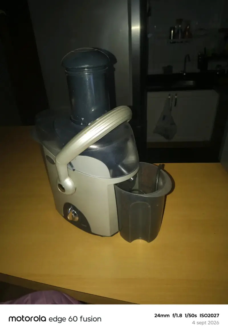 Extractor de Jugo Oster con Asa Práctica - 2