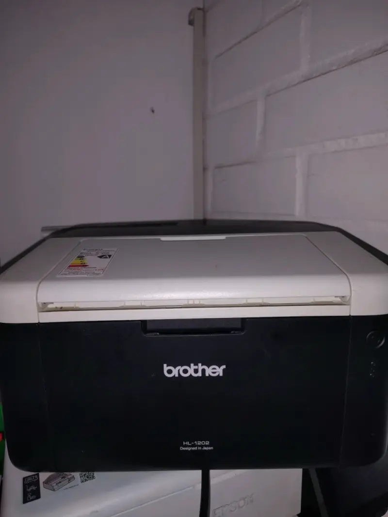 Impresora láser Brother HL-1202 en buen estado - 1