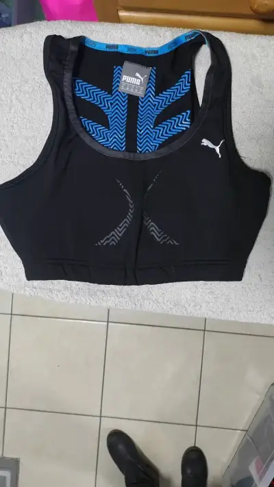 Top deportivo negro Puma para mujer - miniatura 1