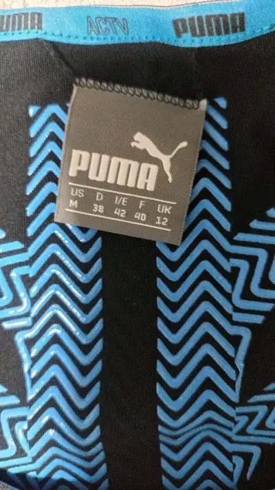 Top deportivo negro Puma para mujer - miniatura 2