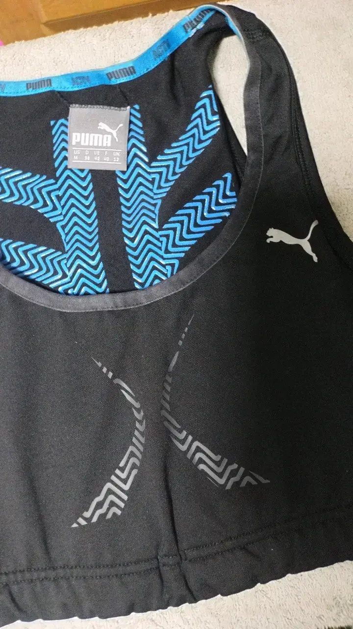 Top deportivo negro Puma para mujer - 3