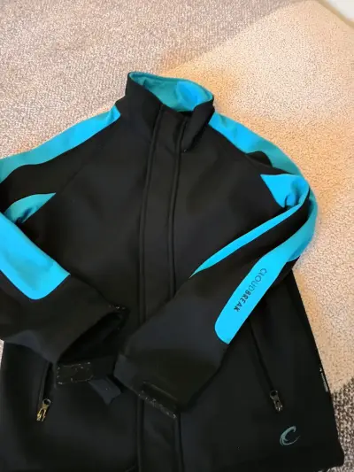 Chaqueta deportiva negra y azul Cloudbreak - miniatura 1