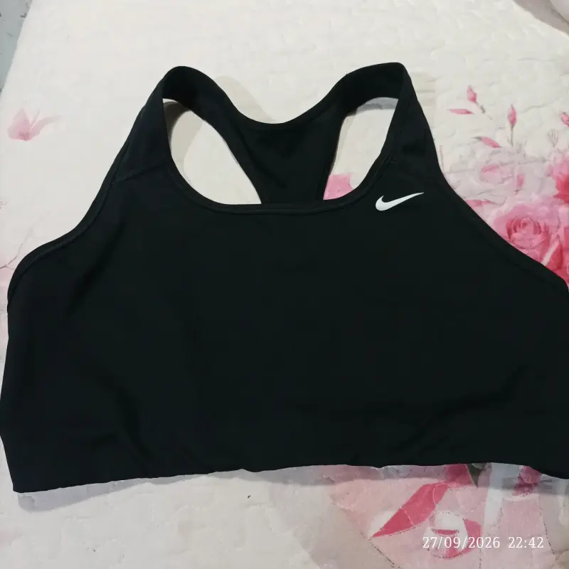 Top deportivo negro Nike Dri-FIT para mujer - 1