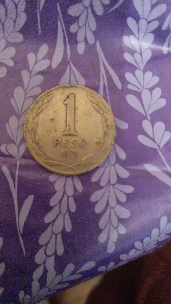 Moneda antigua de 1 peso chileno 1975 - 2