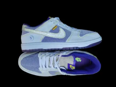 Zapatillas deportivas Nike blancas y moradas - miniatura 2