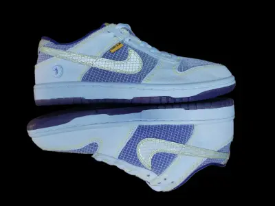 Zapatillas deportivas Nike blancas y moradas - miniatura 3