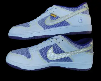 Zapatillas deportivas Nike blancas y moradas - miniatura 6