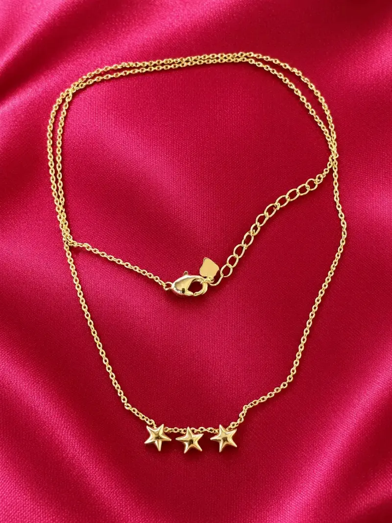 Collar de cadena dorada con colgante de estrellas - 1