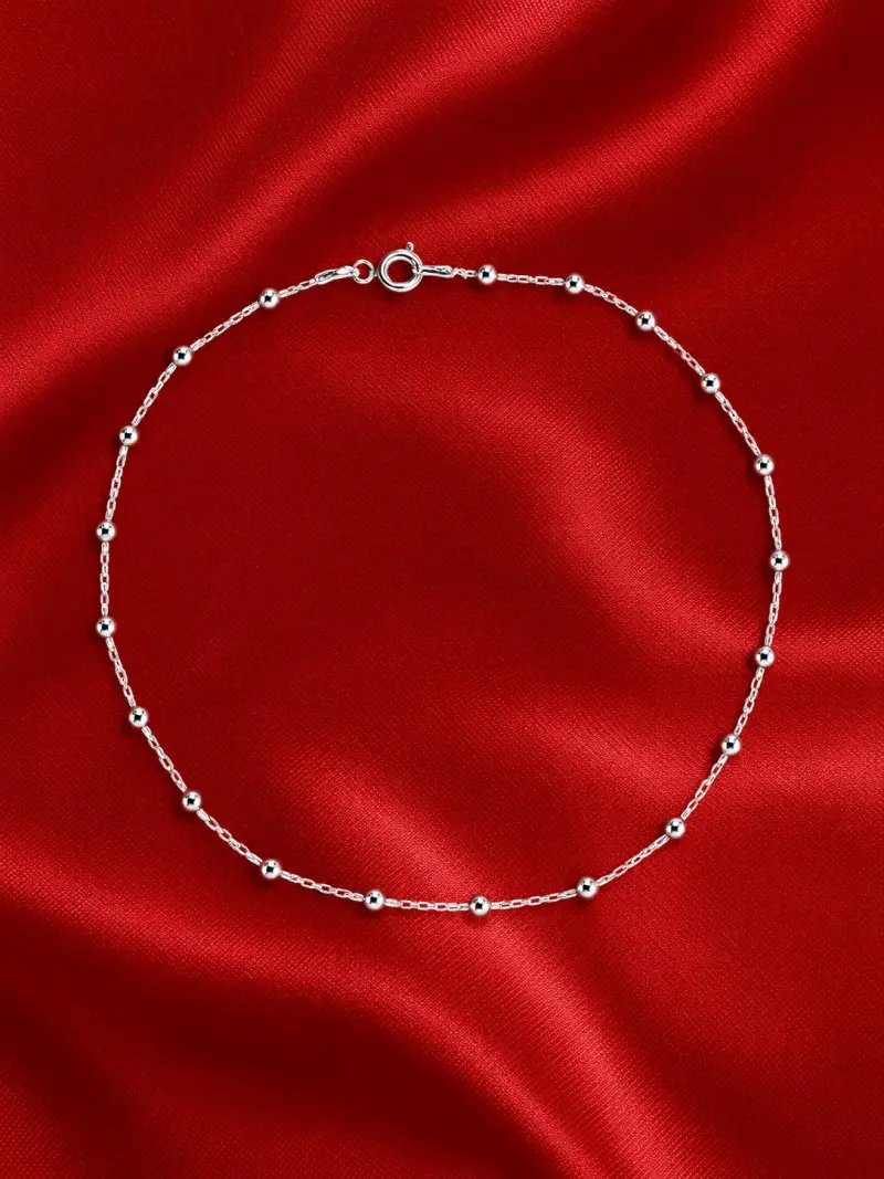 Tobillera de plata con diseño de bolitas - 1