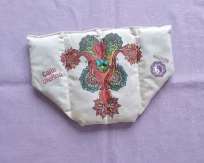 Cojín térmico uterino para alivio menstrual - miniatura 4