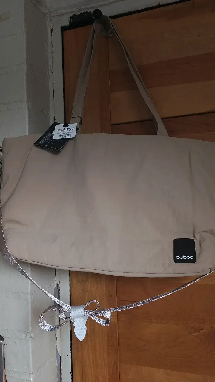 Bolso cambiador beige Bubba con correa ajustable