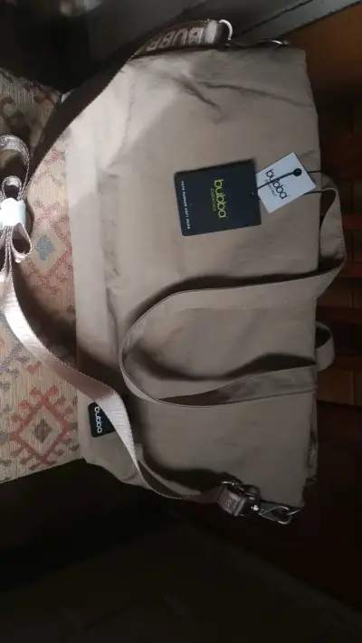 Bolso cambiador beige Bubba con correa ajustable - miniatura 2