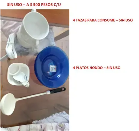 Juego de vajilla sin uso con tazas y platos hondos