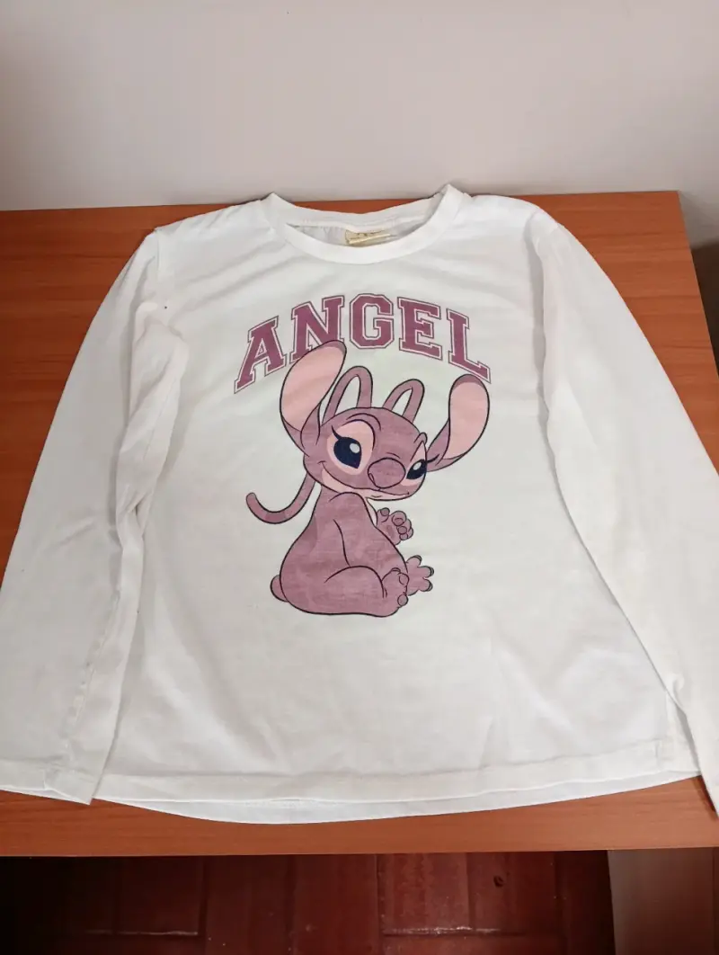 Polera manga larga blanca con diseño de Angel - 1