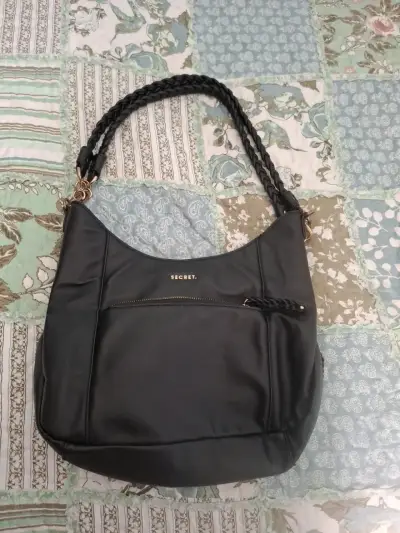Cartera negra Secret con correa trenzada - miniatura 1
