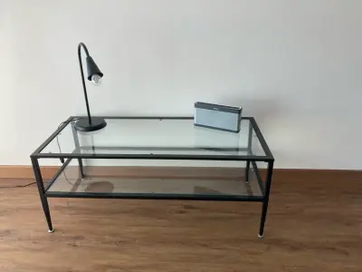 Mesa de centro de vidrio con estructura metálica - miniatura 1