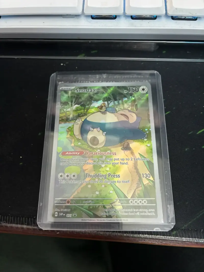 Carta Pokémon Snorlax Holo en Protector