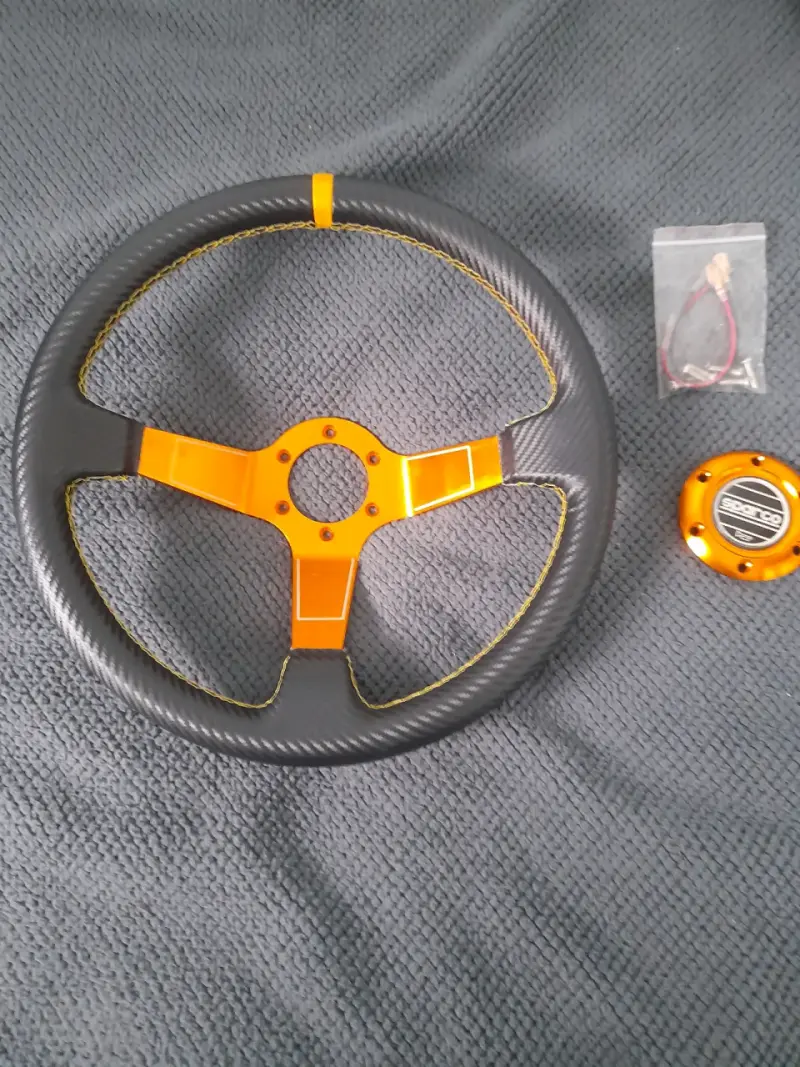 Volante deportivo Sparco negro y naranja - 1