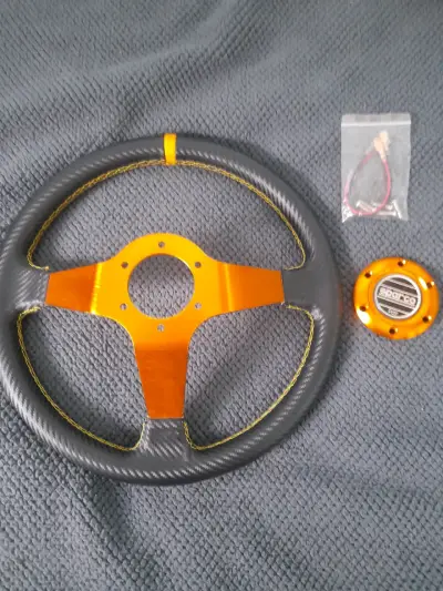 Volante deportivo Sparco negro y naranja - miniatura 2