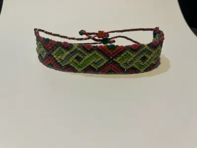 Pulsera tejida multicolor artesanal - miniatura 1