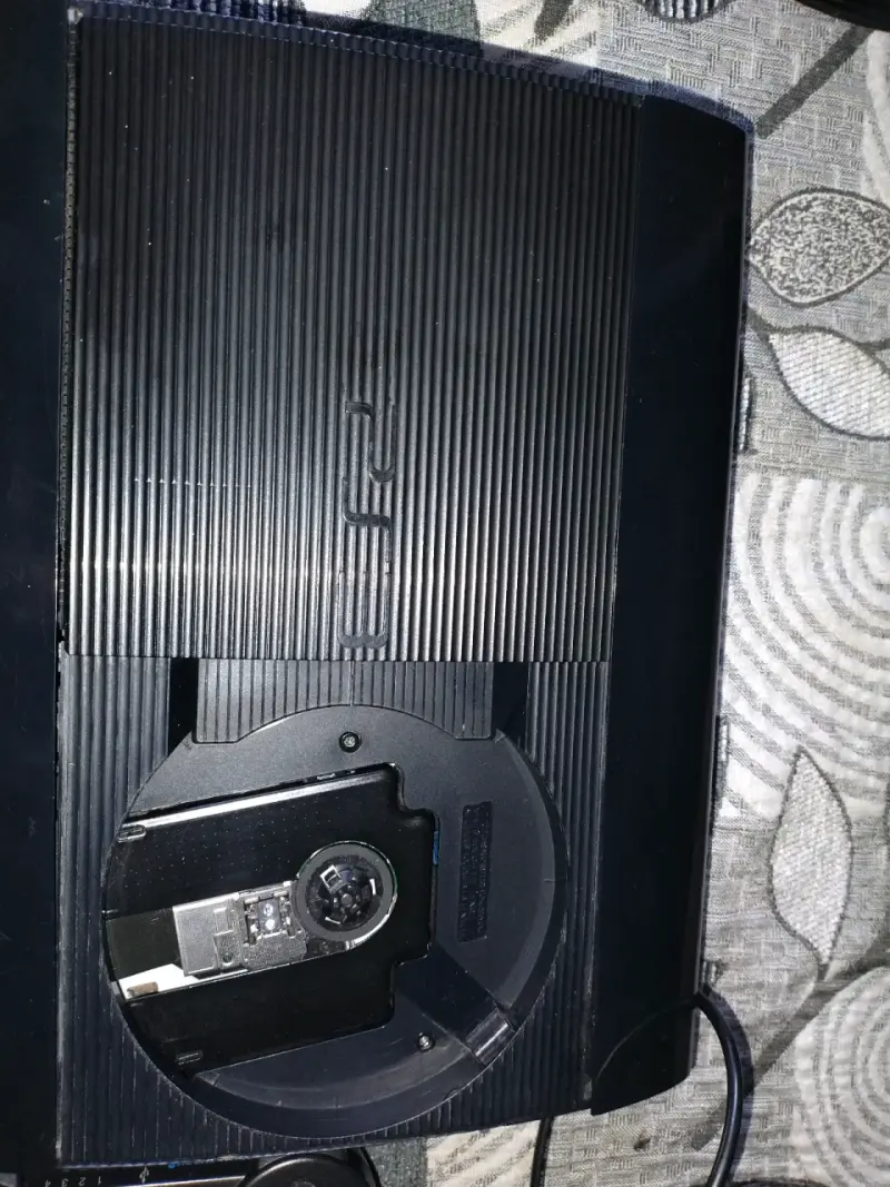 Consola PS3 con control y juegos incluidos - 1
