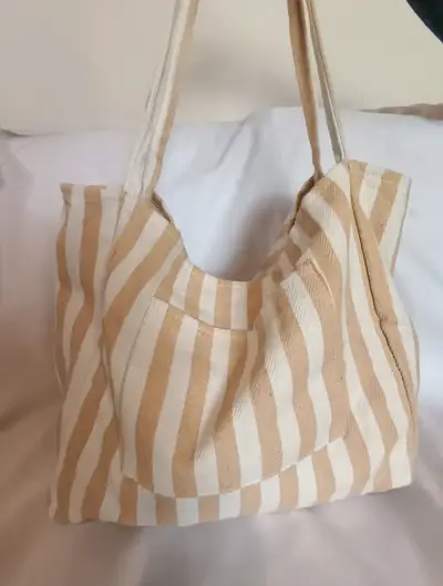 Bolso de tela con estampado de rayas y animal print - miniatura 1