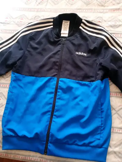 Chaqueta deportiva Adidas original talla 14 niño - miniatura 1