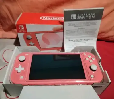 Nintendo Switch Lite  con 2 juegos - miniatura 4