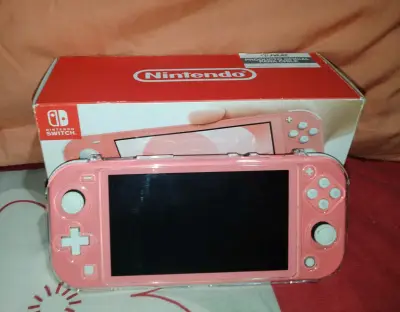 Nintendo Switch Lite  con 2 juegos - miniatura 6