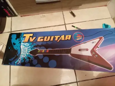 Tv guitarra electrónica - miniatura 1