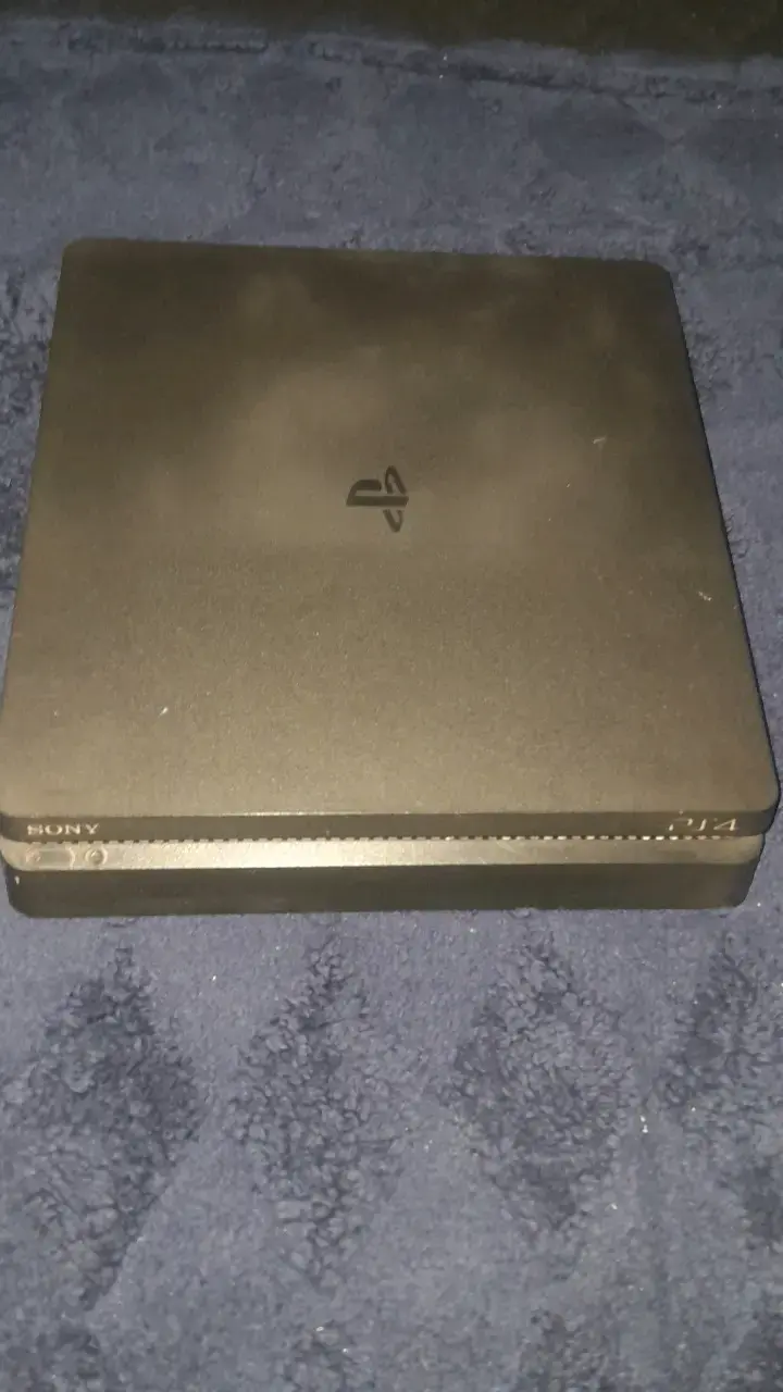 Consola Sony PlayStation 4 Slim negra - 1