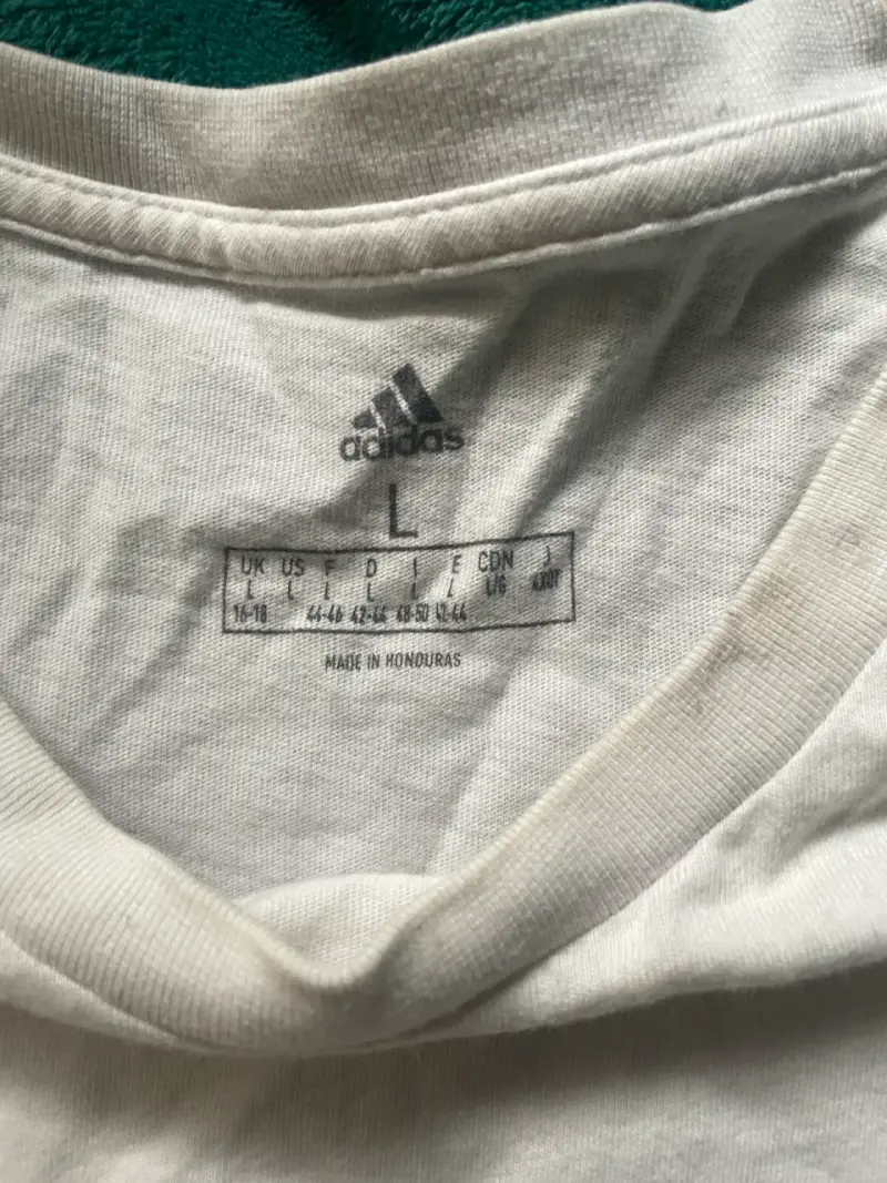 Polera deportiva blanca Adidas con franjas negras - 2