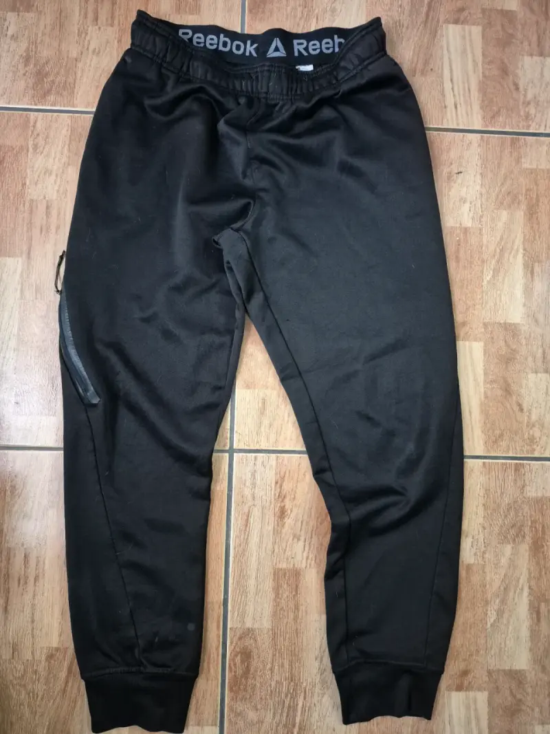 Pantalones deportivos negros Reebok para hombre