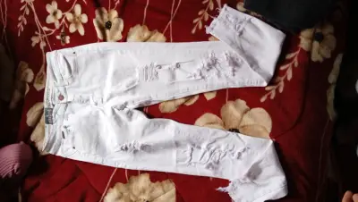 Jeans blancos rasgados para mujer - miniatura 1