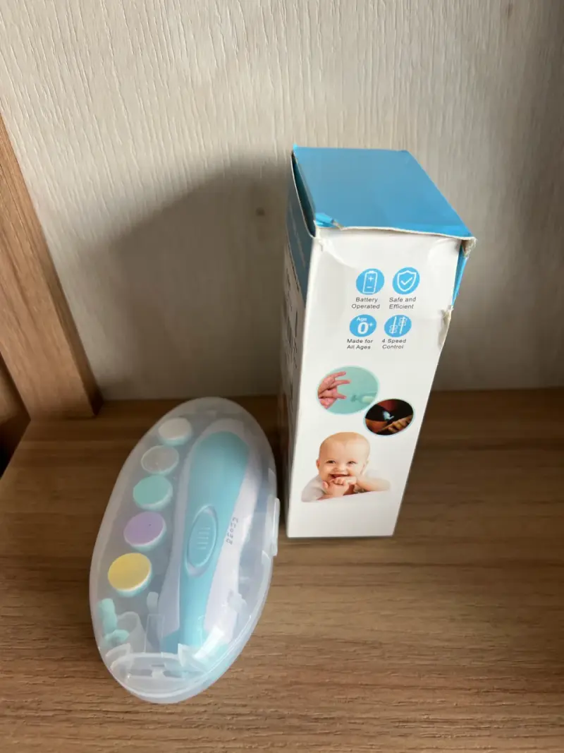 Lima de uñas eléctrica para bebés con accesorios - 1