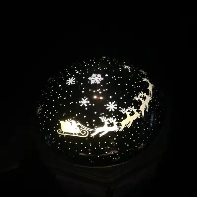 Caja decorativa navideña con luz y musica - miniatura 4