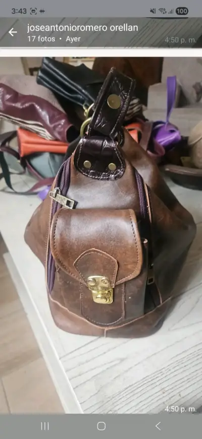 Mochila de cuero marrón con cierre metálico - miniatura 1