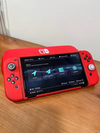 Consola Nintendo Switch OLED roja con estuche - miniatura 1