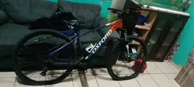 Bicicleta de montaña azul con suspensión oxford - miniatura 6