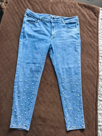 Jeans azules con perlas para mujer - miniatura 1