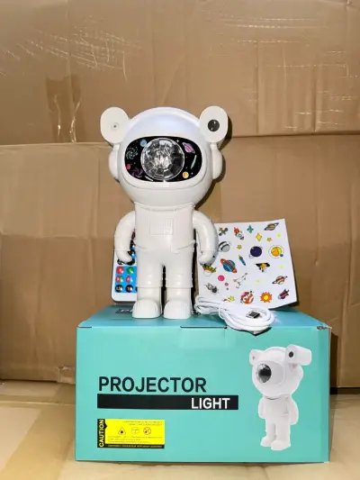 Proyector de luz en forma de astronauta con control remoto - miniatura 1