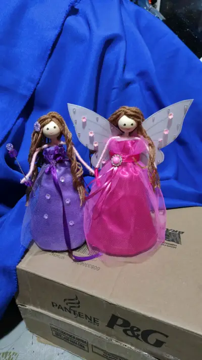 Muñecas de tela con alas de hada - miniatura 1
