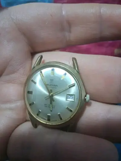Reloj automático vintage Eterna dorado - miniatura 1