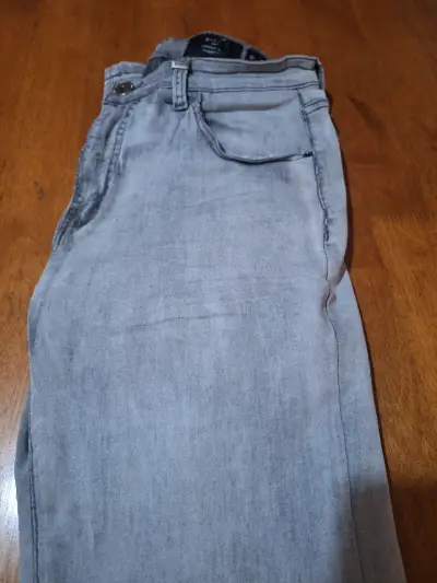 Jeans grises para hombre en buen estado - miniatura 1