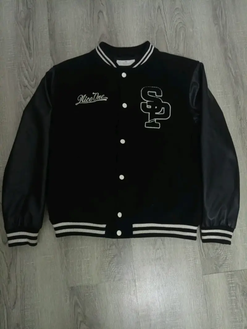 Chaqueta varsity negra H&M para niño