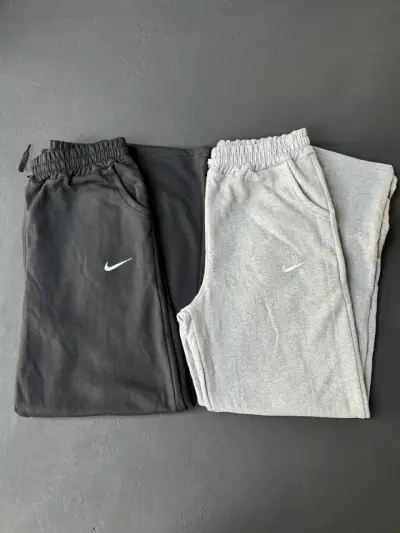 Pantalones deportivos Nike negros y grises - miniatura 1