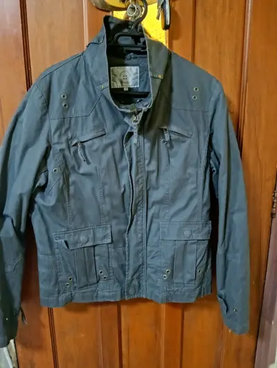 Chaqueta de mujer gris con bolsillos - miniatura 1